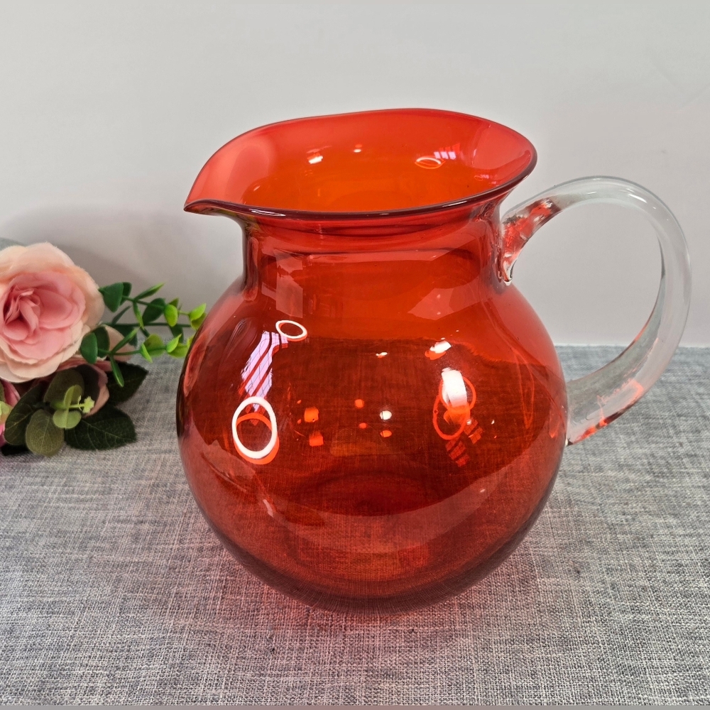 Vintage‎ Hand Blown Glass Pitcher Orange With Clear Applied Handle 6"